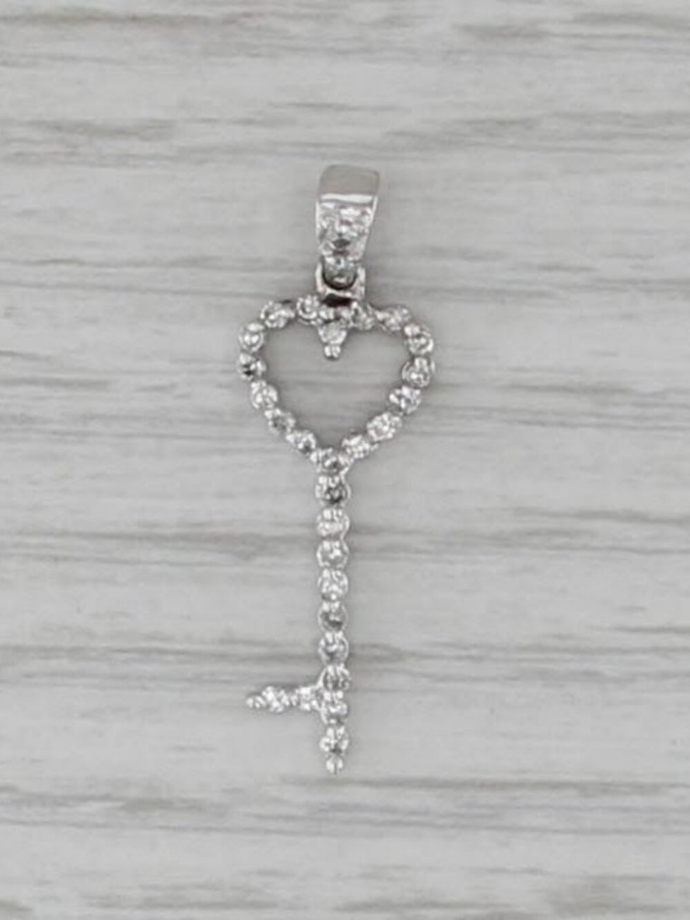 0.20ctw Diamond Heart Skeleton Key Pendant 14k White Gold